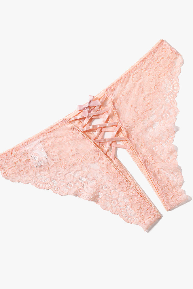 Peach lace hipster panty with criss-cross straps and double bow detail. Perfect for a sweet night.