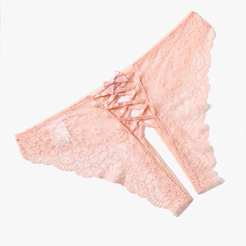 Peach lace hipster panty with criss-cross straps and double bow detail. Perfect for a sweet night.