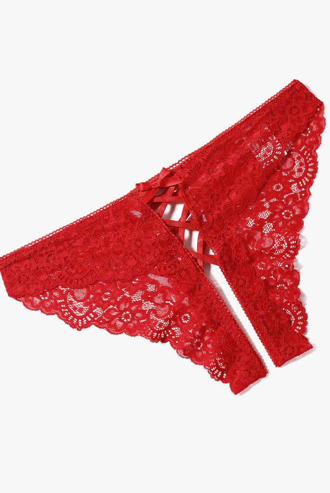 Red lace hipster panty with criss-cross straps and bow detail. Floral lace design.