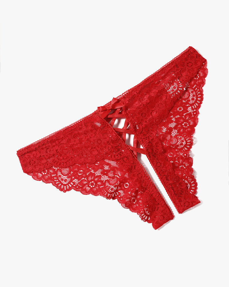 Red lace hipster panty with criss-cross straps and bow detail. Floral lace design.