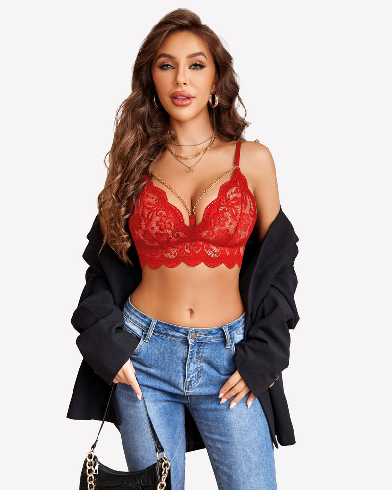 Red lace bra with chain details, part of a lingerie set. Confident and stylish look.