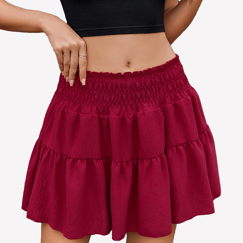 Red flowy A-line short skirt with shirred waist, flattering curve, black crop top