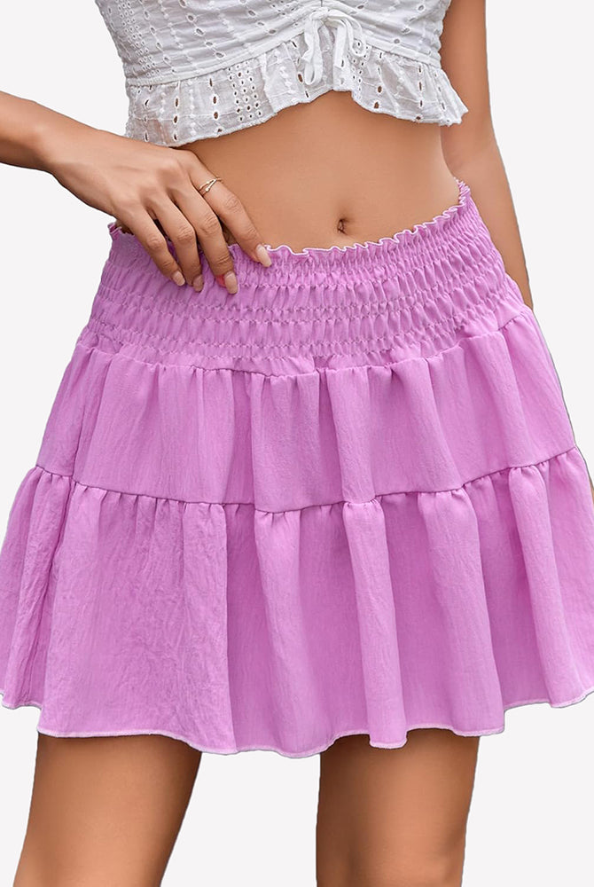 Light purple flowy A-line short skirt with tiered ruffles and elastic smocked waistband