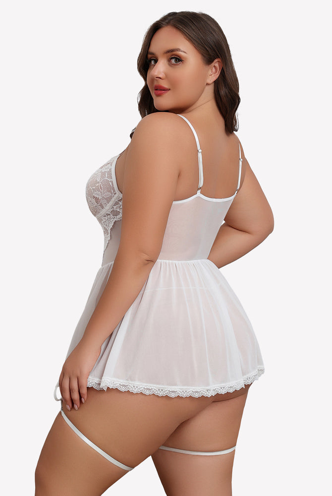 Plus size white lace babydoll with garter belt, sheer cups and mesh skirt, model wearing lingerie