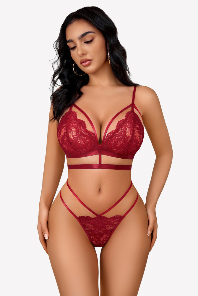 Burgundy lace bra and panty set with strappy details. Sexy lingerie set for women.