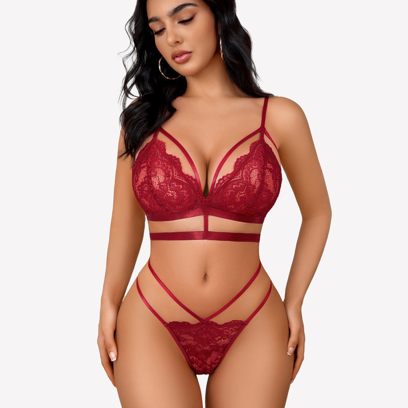 Burgundy lace bra and panty set with strappy details. Sexy lingerie set for women.