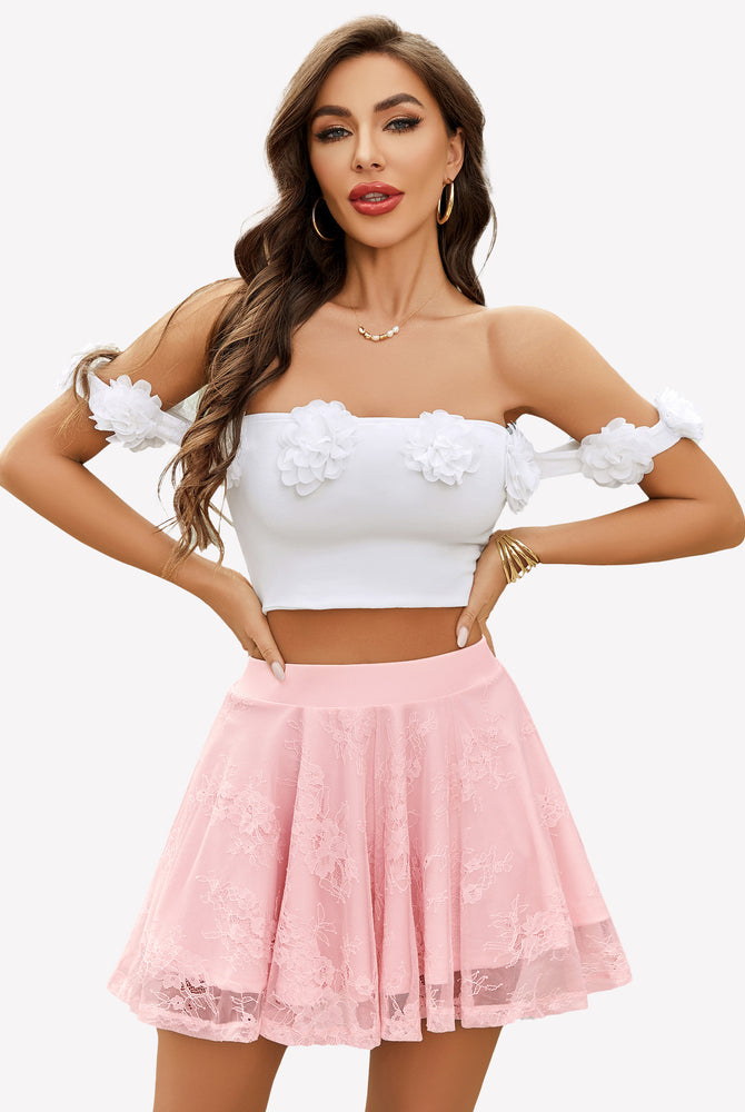 Pink lace skater skirt with white floral top, A-line silhouette, stylish outfit.