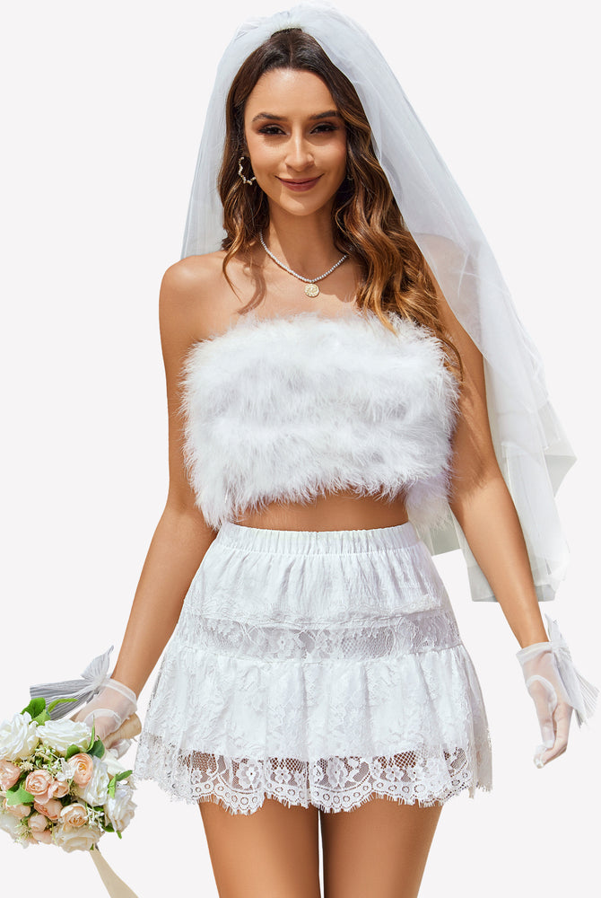 White Y2K lace trim bridal skirt with feathery crop top, elastic closure, confident look.