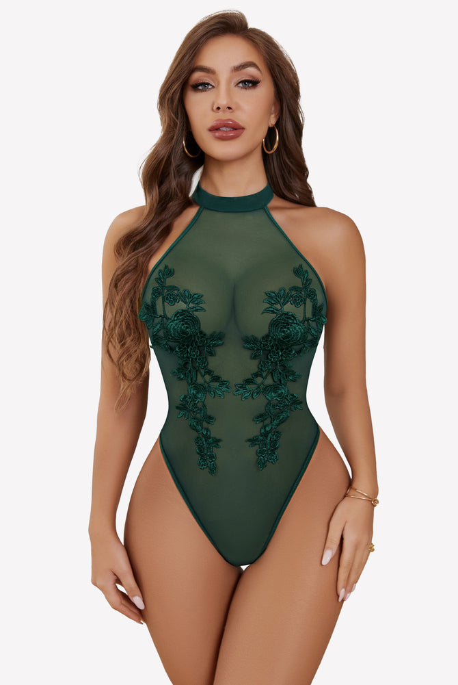 Green mesh embroidered bodysuit with halter neck, enhancing confidence and inner beauty.