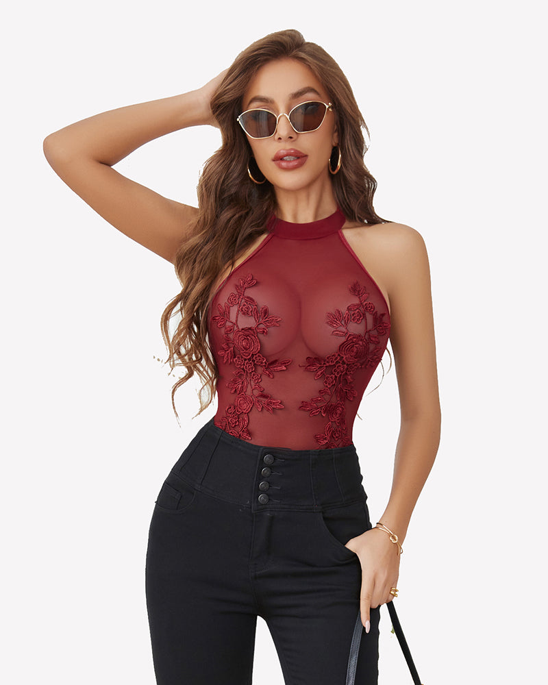 Burgundy mesh embroidered bodysuit with halter neck and floral lace, enhancing confidence.