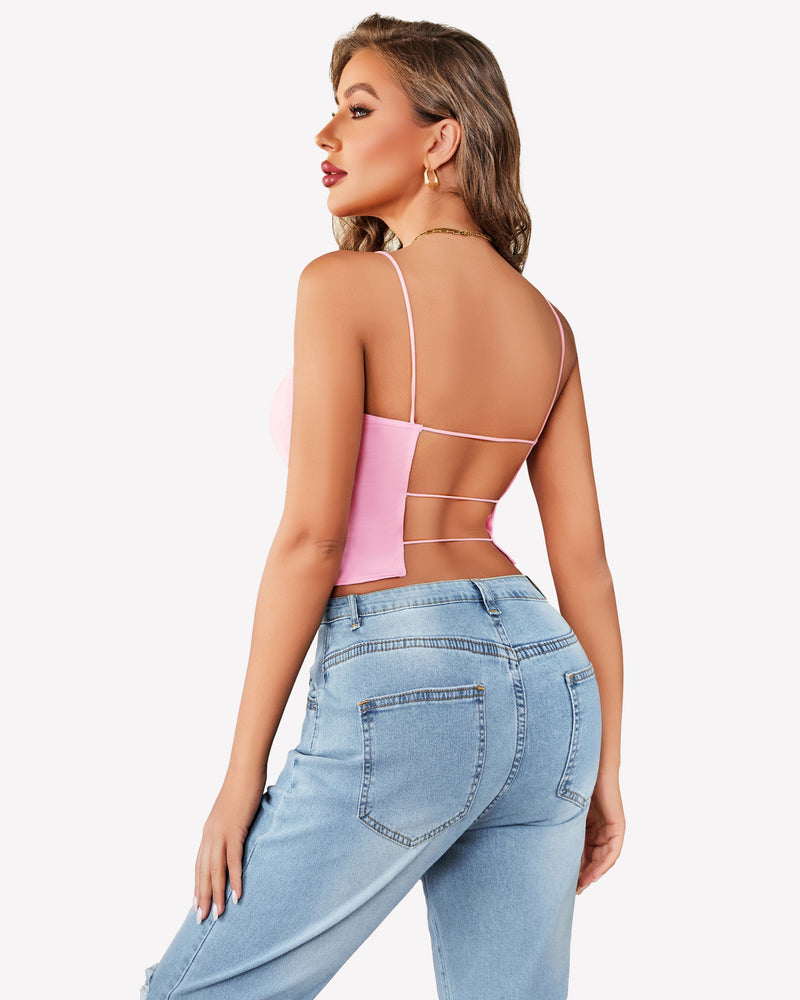 Pink backless cropped top with thin straps and light blue jeans, summer outfit
