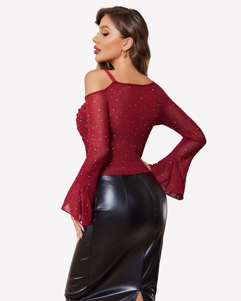 Burgundy mesh rhinestone off-shoulder top with long sleeves and black leather skirt