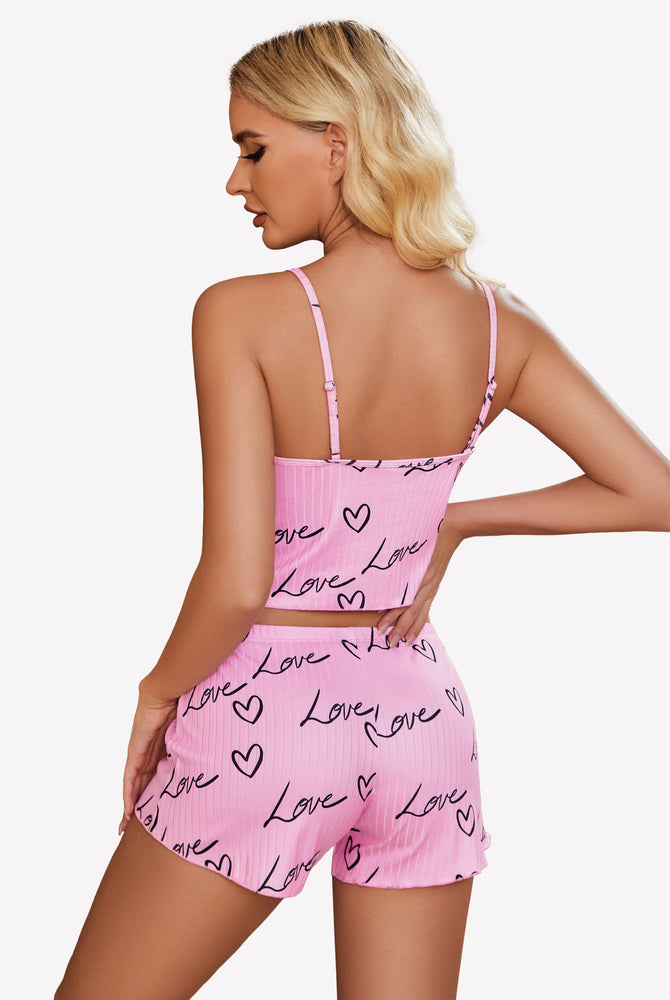 Pink ribbed lounge set with 'Love' and heart print, soft and comfortable sleepwear.