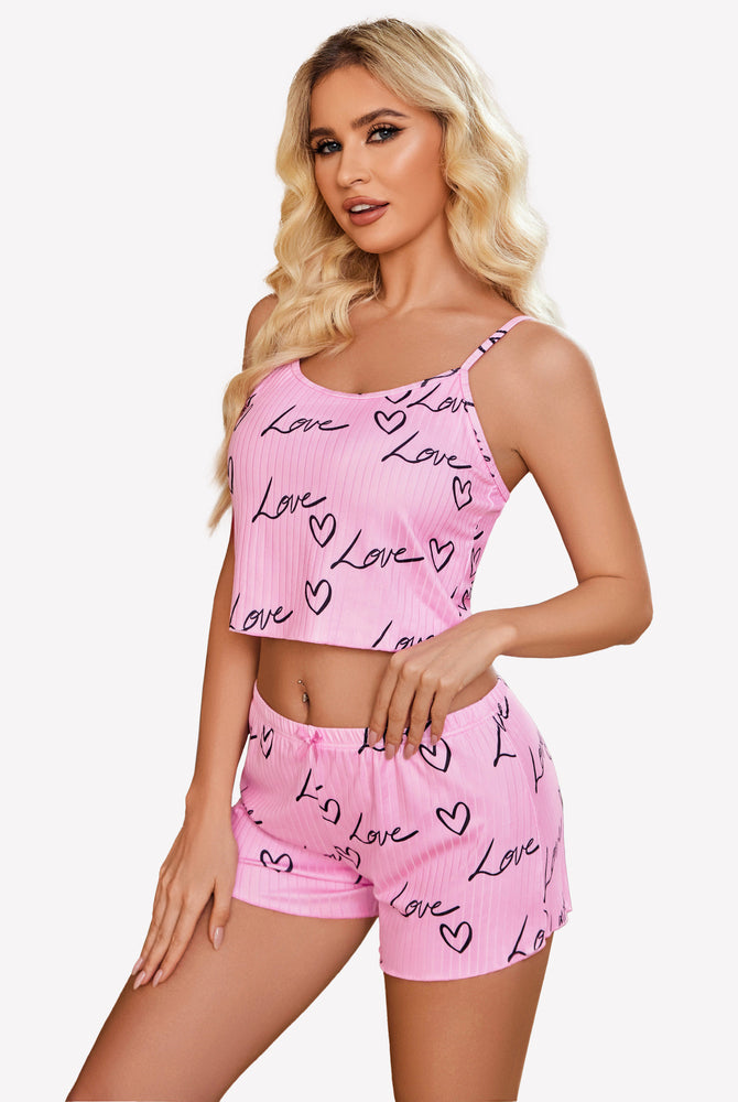 Pink ribbed lounge set with 'Love' and heart print, comfortable sleepwear for women.