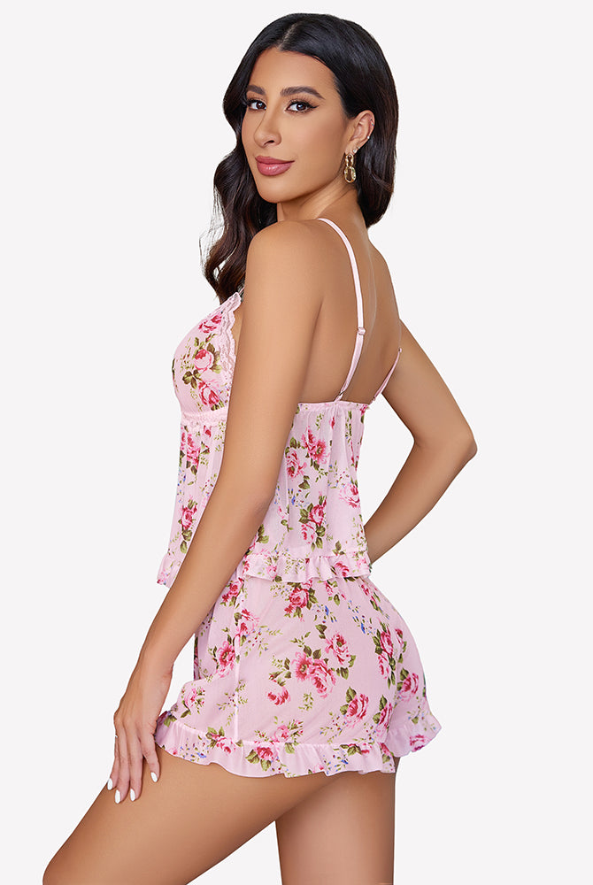 Pink floral mesh cami lingerie set with deep V-neck, lace trim, and ruffled shorts.
