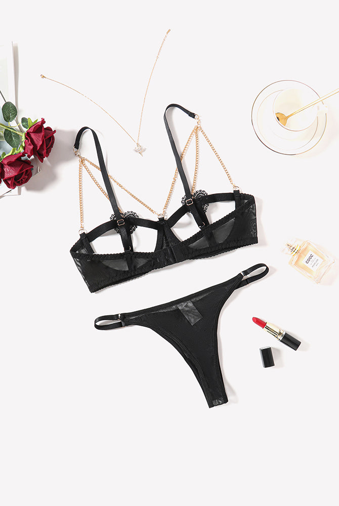 Black chain heart cutout lingerie set with gold chain details, perfect for romantic nights