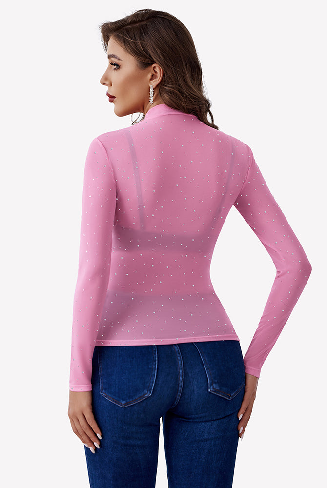 Pink mesh rhinestone sheer top with long sleeves and blue jeans - party outfit