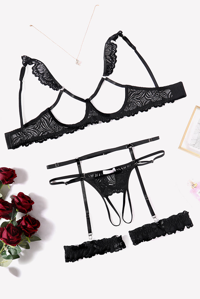 Black floral lace lingerie set: bra, garter belt, and g-string. Perfect for a romantic night.