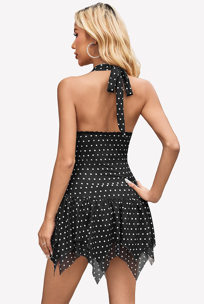 Halter backless mini dress in black with white polka dots and back tie halter