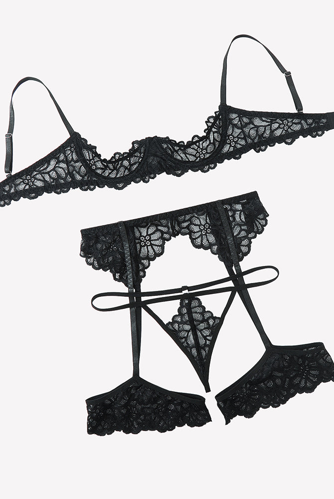 Black lace lingerie set pieces: lace bra band, garter belt, thong, and straps