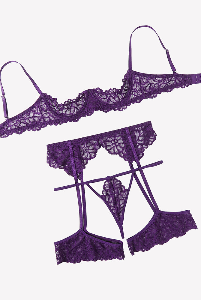 Lace lingerie set with garter belt in purple lace bra, panties, and garter belt