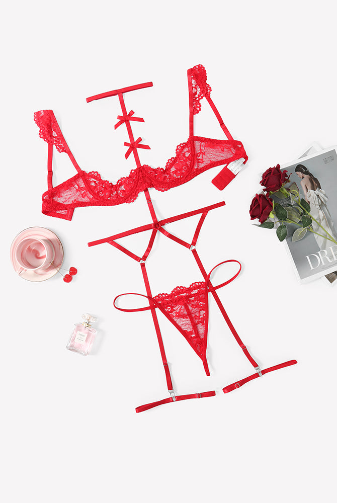 Red lace lingerie set with lace bra, choker, garter belt, and thong panties