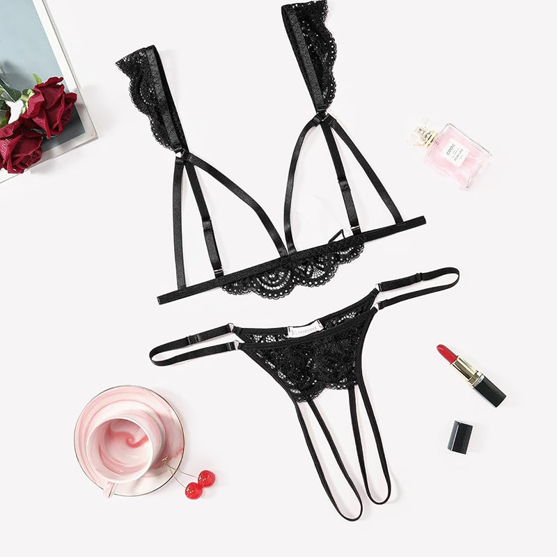 Black lace triangle bra with adjustable straps and matching thong, cutout sides