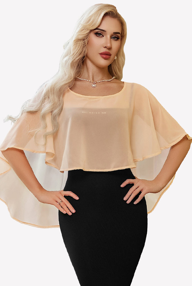 Champagne chiffon cape shawl with draped flutter sleeves over a straight neckline.