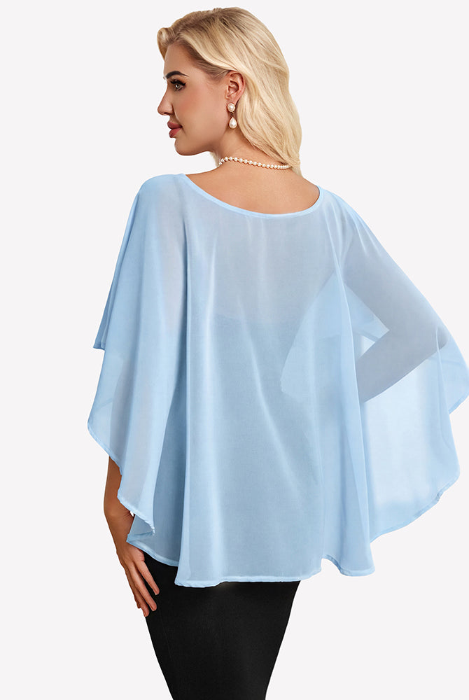 Light blue chiffon cape shawl with flowing cape sleeves, angled view