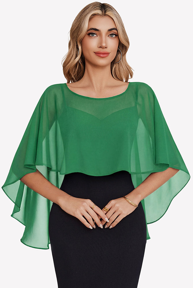 Green chiffon cape shawl with draped half-sleeve overlay over a dress