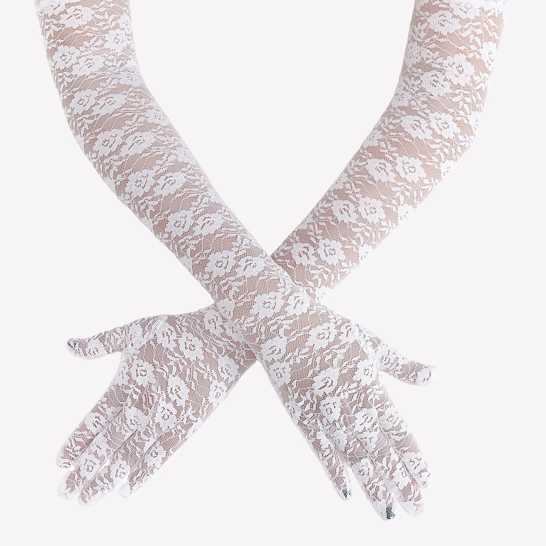 Elbow-length white lace gloves with floral lace pattern and long fingered cuffs
