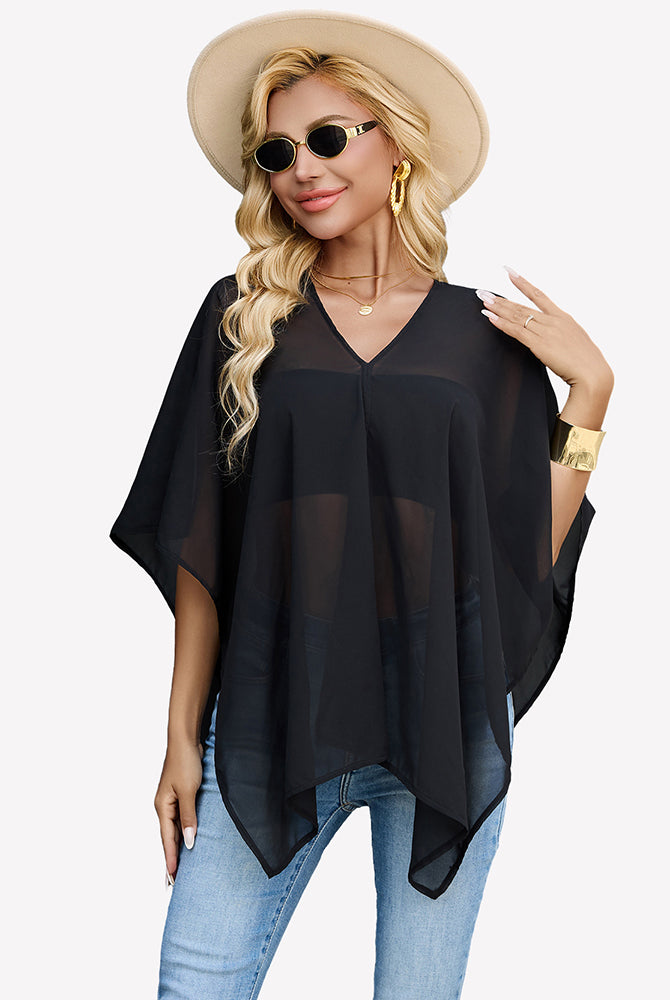Black chiffon blouse with V neckline and draped batwing sleeves, asym hem.