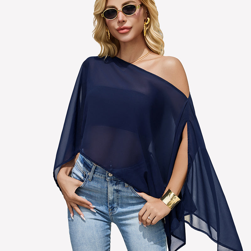 Navy blue off-shoulder chiffon blouse with batwing sleeves and draped asym hem.
