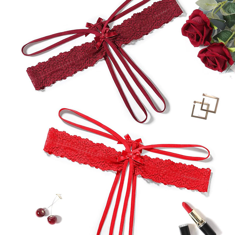 Assorted red lace G-string thongs with bows and long tie straps
