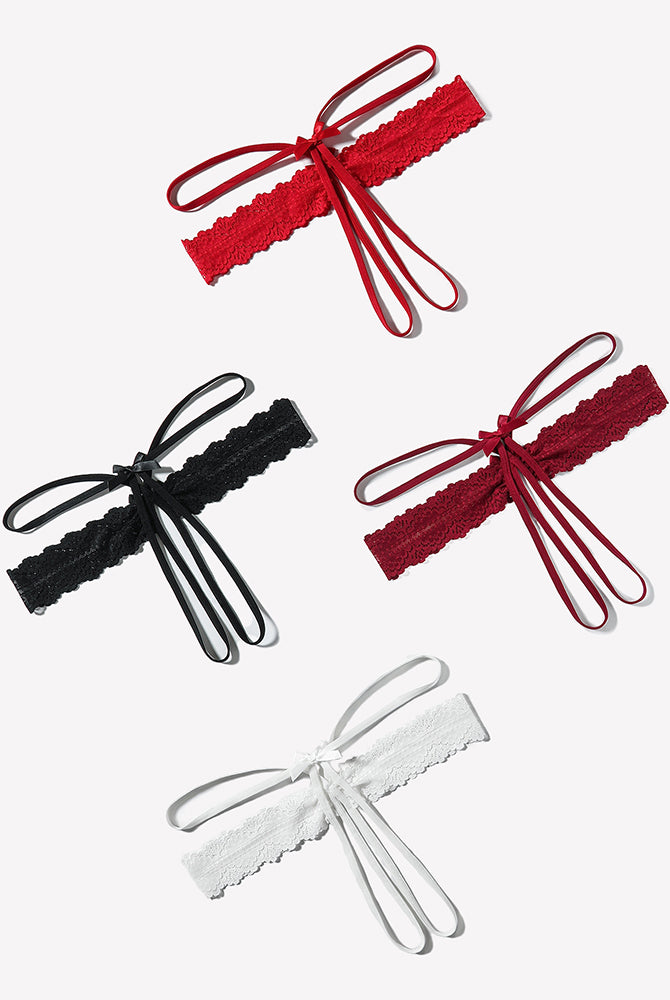 Lace hollow-out thong G-string with bow lace band and ribbon ties, black, red, and white