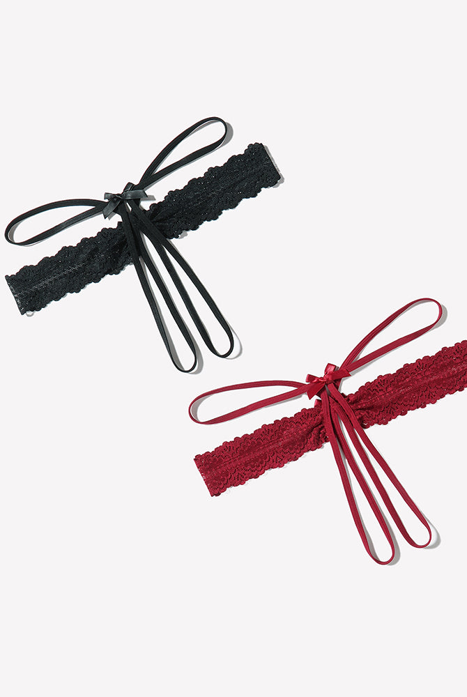 Lace hollow-out thong g-string underwear in black and red with bow and tie details