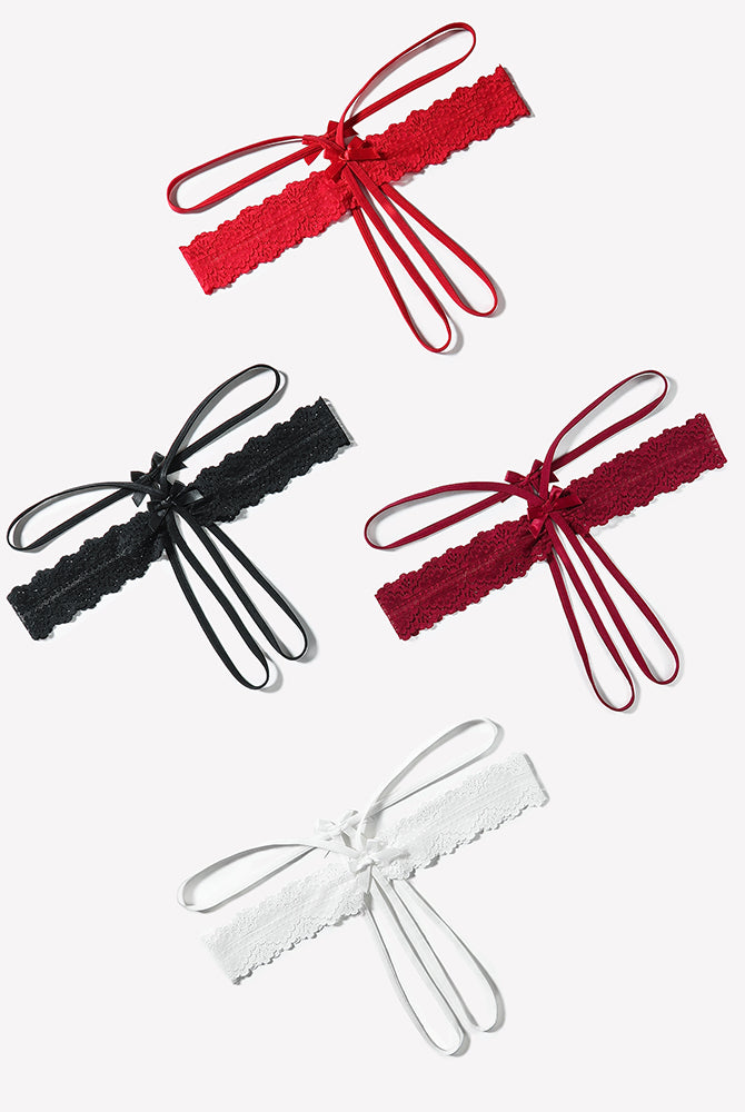 Lace hollow-out thong G-string with bow lace band and ribbon ties, red, black, and white