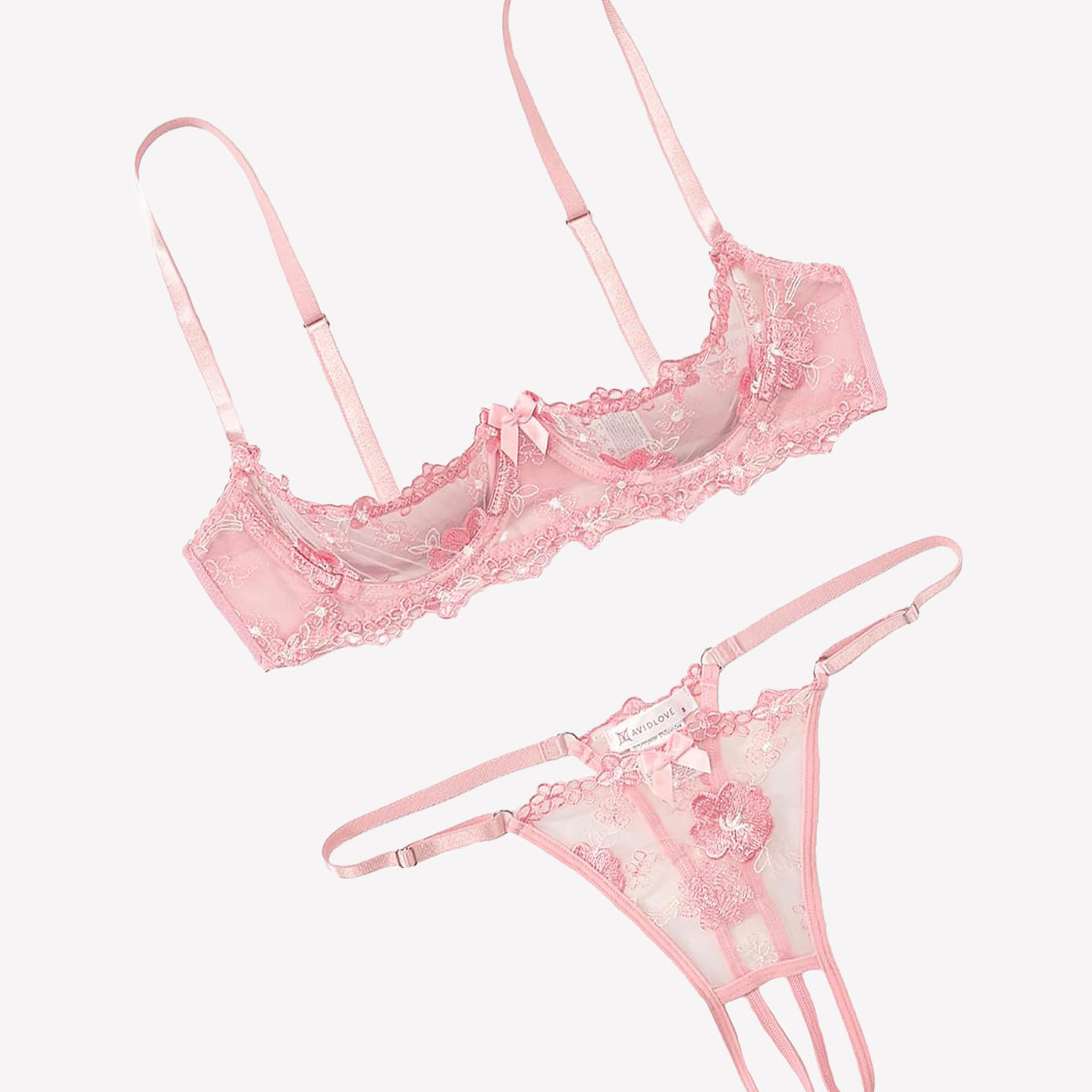 Embroidered underwire bra and thong set in soft pink lace with floral embroidery