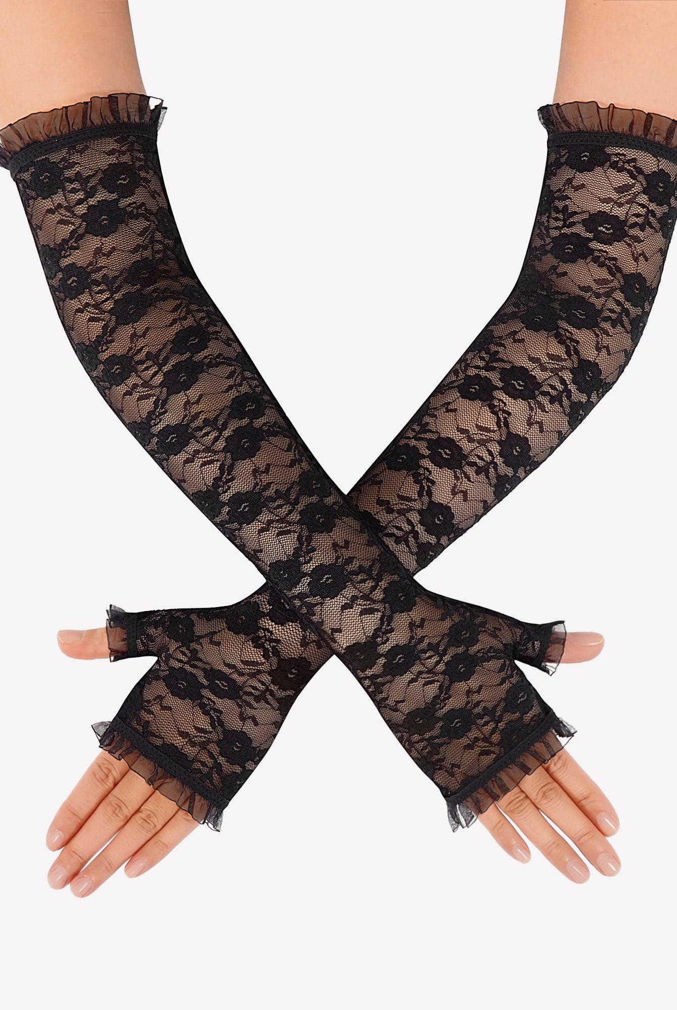 Long black lace fingerless gloves with frilled cuffs, hands crossed at wrists