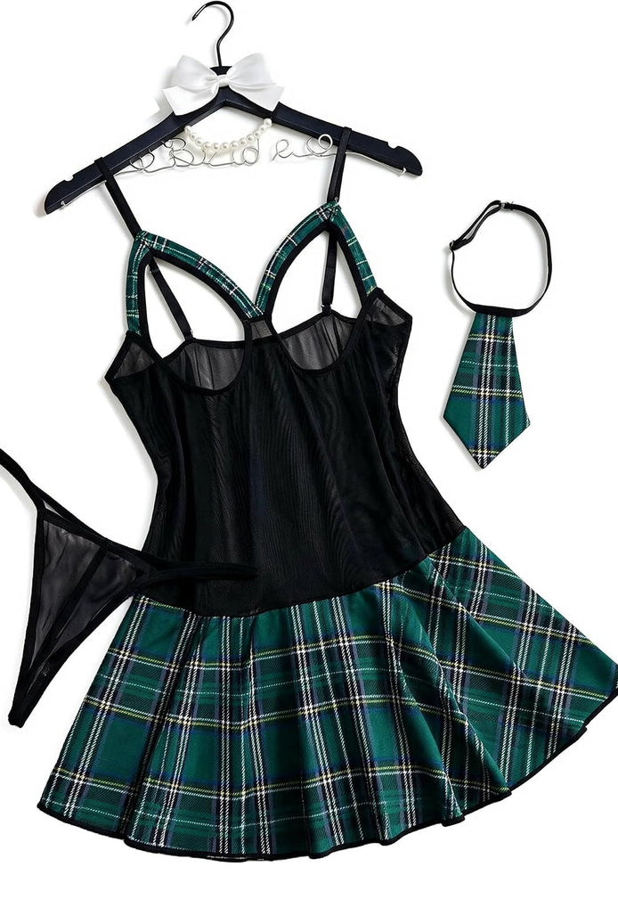 Plaid schoolgirl costume dress set with black corset-style top and green skirt, tie thong