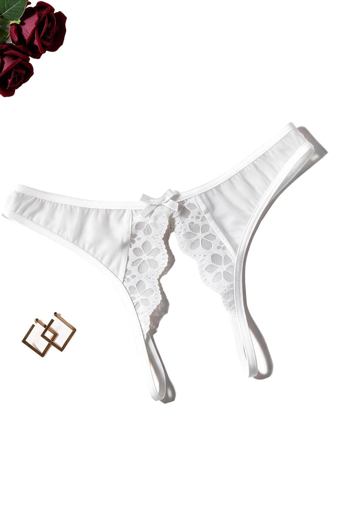 White low-rise lace thong with floral cutouts and bow detail