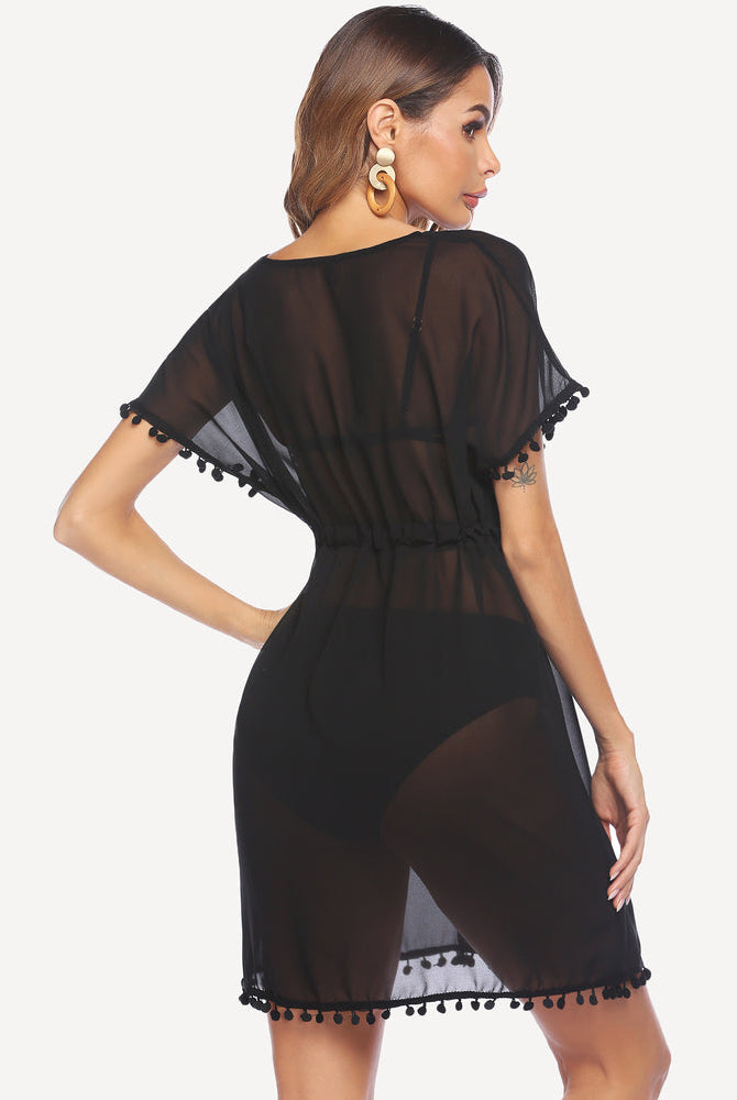 Black chiffon swimsuit coverup with tassels. Lightweight, sheer, and perfect for the beach.