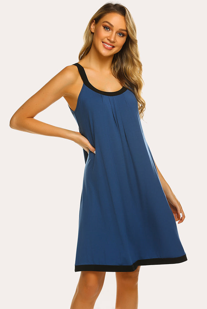 Blue nightdress with black contrast trim, scoop neck, and flared front pleats