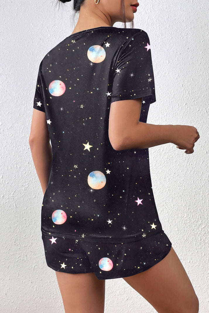 Black short-sleeve pajama set with planet and star print; matching shorts