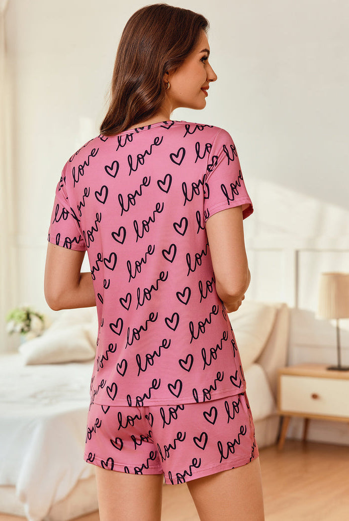 Pink love heart short-sleeve pajama set with matching shorts, back view, 2-piece lounge