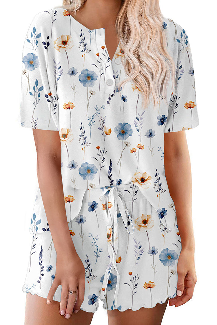 Women's white floral short-sleeve pajama set with button top and drawstring shorts