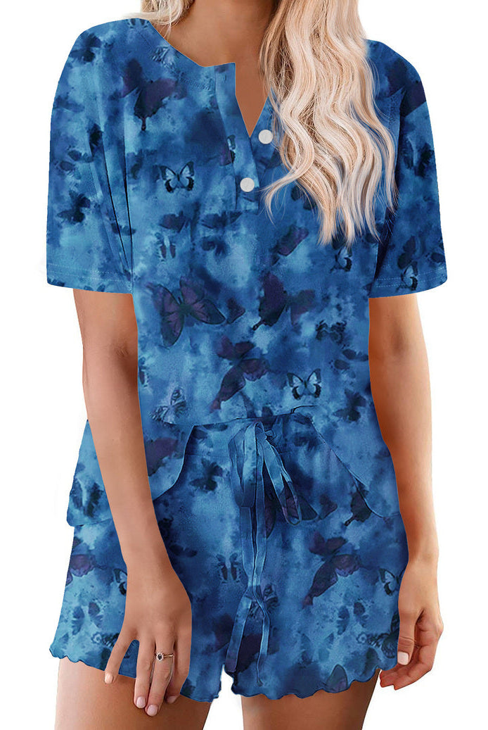 Women’s blue tie-dye pajama set, short-sleeve button-up top with V-neck and matching shorts