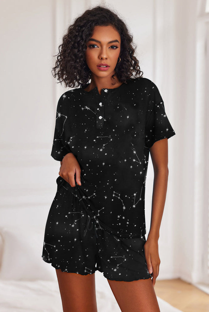 Women's black star-print short-sleeve pajama set with button top and drawstring shorts