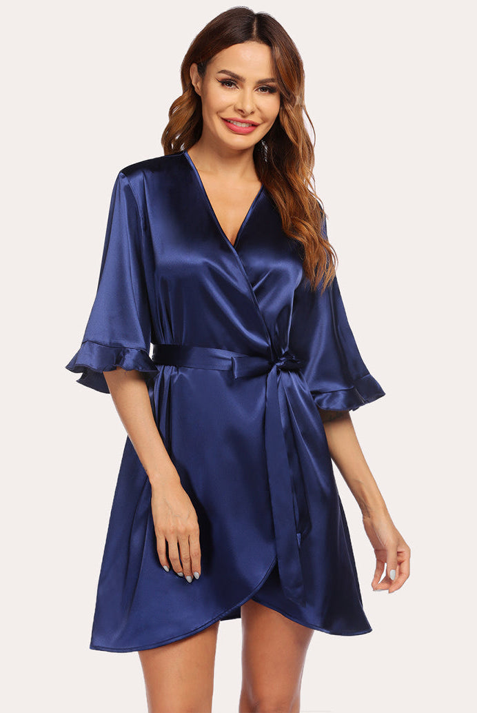 Navy blue satin half-sleeve robe with V-neck, tie belt, and wrap front with side slit.