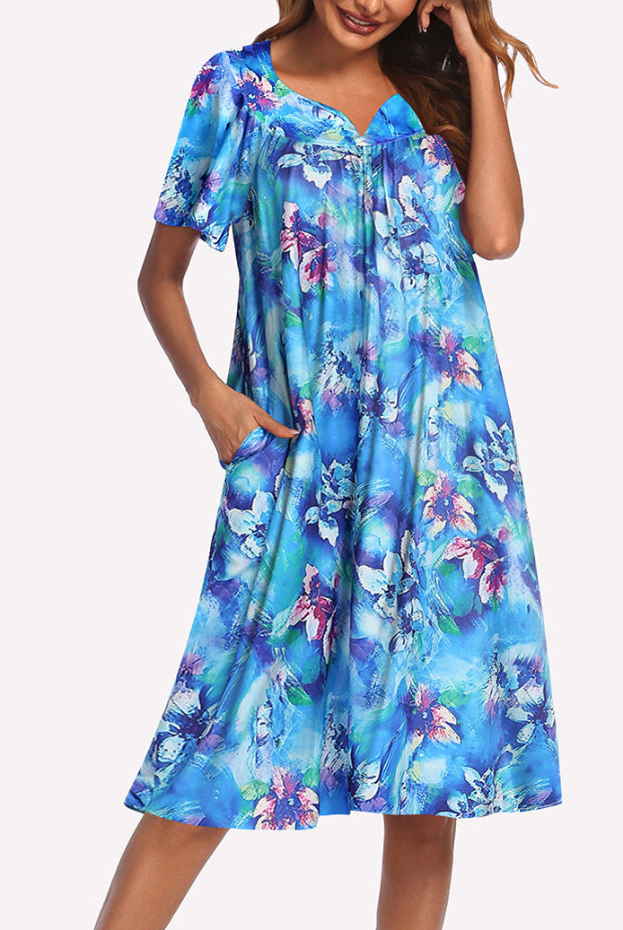 Floral short-sleeve nightgown in blue with gathered V-neck and knee-length skirt